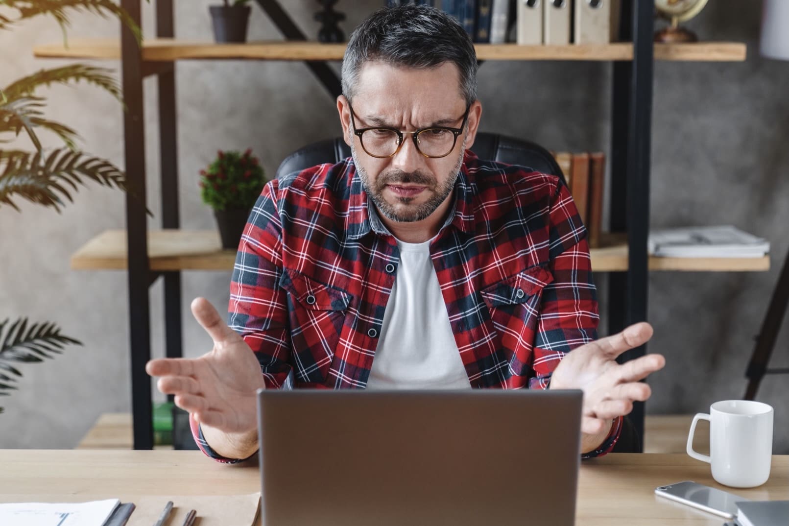 Business owner frustrated by ranking drops after a poorly planned website migration